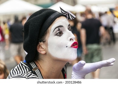 NEW YORK, USA - JULY 11, 2011: New Yorkers Celebrate The Bastille Day In 60th Street Street With Attracations For Children, Face Painting And Colorful Costumes In New York, USA.