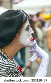 NEW YORK, USA - JULY 11, 2011: New Yorkers Celebrate The Bastille Day In 60th Street Street With Attracations For Children, Face Painting And Colorful Costumes In New York, USA.