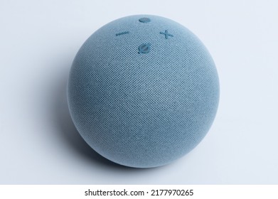 New York, USA - July 12, 2022: Amazon Alexa Voice Assistant  Speaker With Buttons Close Up View