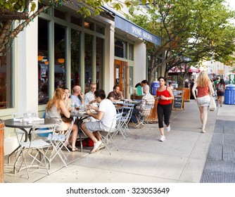 New York, New York, USA - July 14, 2011: People Are Eating In Outdoor Seating At A Restaurant On Lafayette Street In The Soho District Of Manhattan.