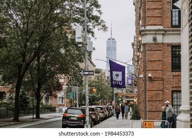 New York, USA - June 1, 2021 - New York University NYU campus buildings and banner with Manhattan skyline