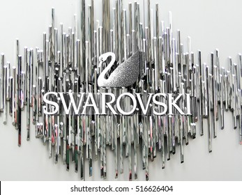 New York, USA, June 1 2011: The Swarovski swan symbol and logo on a store front in Manhattan 