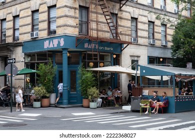 New York, New York USA - June 18 2022: Exterior Of A Beautiful Restaurant On A Corner With An Outdoor Dining Setup In Greenwich Village Of New York City