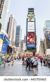 New York, USA - June 18, 2016: Vertical View Of Busy Times Square During The Day With Advertisements For Samsung And Musicals