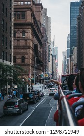 New York, USA - June 2, 2018: View Of 7th Street From The Top Of Tourist Bus. 7th Street Is A Street In Manhattan, Known For Madison Square Garden, Penn Station, Carnegie Hall Amongst Other Landmarks.