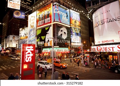 New York, New York, USA - June 2, 2011: Times Square New York. The Corner Of 7th Avenue And 47th Street Showing The Many Illuminated Billboards. 