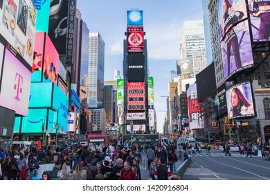 New York, USA - June 2019 - People Walking Down Seventh Avenue At Times Square At Day, Manhattan.