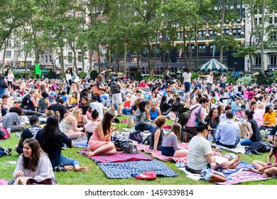 New York / USA - June 30 2019: People In Bryant Park Waiting For The Movie Night