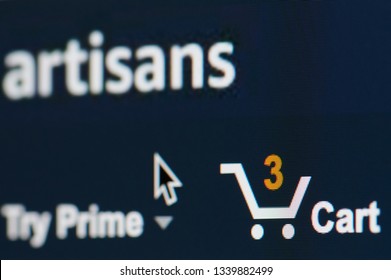 New york, USA - march 15, 2019: Amazon shopping cart with items on laptop screen close up view