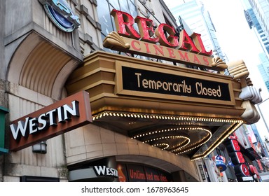 NEW YORK, USA - MARCH 19, 2020: 
A Closed Movie Theatre And Hotel Are Seen In Times Square Following The Outbreak Of Coronavirus Disease (COVID-19), In New York City, New York.