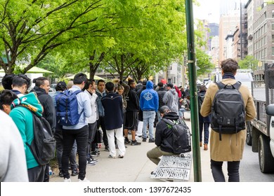 New York / USA - May 11 2019: People Staying In Line To Apply For Sneakers Raffle