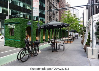 New York, New York USA - May 15 2021: Elegant Outdoor Dining Area Along A Street At A Fancy Restaurant In Midtown Manhattan During The Covid-19 Pandemic In New York City