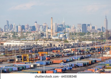 New York, USA- May 20, 2014. Cargo shipping containers with New York City view in background.