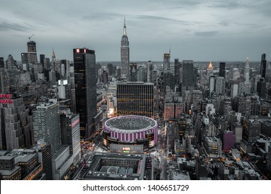 New York / USA - May 23 2019: View From Top On Madison Square Garden And Empire State Building. Night Lights