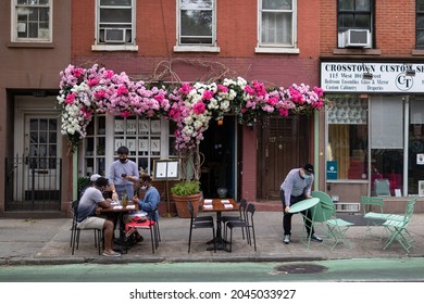 New York, New York USA - May 24 2021: Restaurant With Outdooring Seating Along The Sidewalk In Greenwich Village Of New York City During The Covid-19 Pandemic