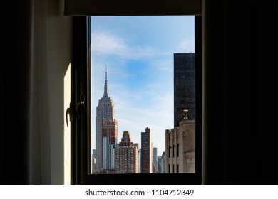 NEW YORK, USA - MAY 27 2018 - Manhattan Skyline View From Hotel Room. Luxury Hotels Very Expensive