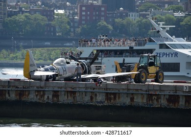 NEW YORK, USA - MAY 29, 2016: P-47 Thunderbolt WW-2 Era Plane Crashed Into The Hudson River. The Plane Was Moved Temporarily To The Pier 6 Heliport In Manhattan For Inspection And Transport.