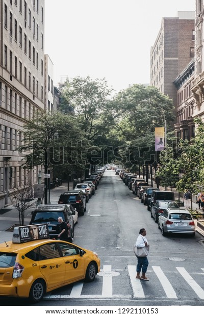 New York, USA - May 30, 2018: Yellow taxis\
on the street in New York, USA, in summer. Yellow taxis are\
recognised worldwide as the icons of the\
city.