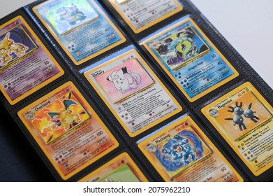 New York, USA - November 10, 2021 : 1995 Pokemon Cards, Pokemon Cards Distributed On The White Table. Collectible Cards 1995