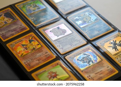 New York, USA - November 10, 2021 : 1995 Pokemon Cards, Pokemon Cards Distributed On The White Table. Collectible Cards 1995