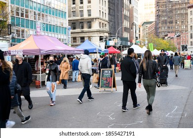 New York, New York, USA - November 14, 2020: People In Union Square Green Market With Face Masks During The Covid-19 Pandemic.