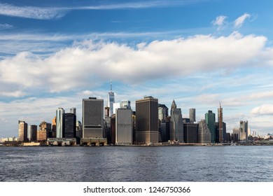 NEW YORK, NEW YORK, USA – November 25, 2018: The skyline of downtown Manhattan, viewed from a ferry. - Shutterstock ID 1246750366