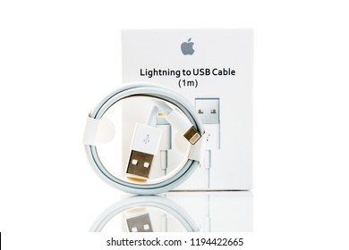 New York, USA - October 01, 2018: Apple lightning to usb cable with original package isolated on white background. Apple cable for devices connections. Electronics.