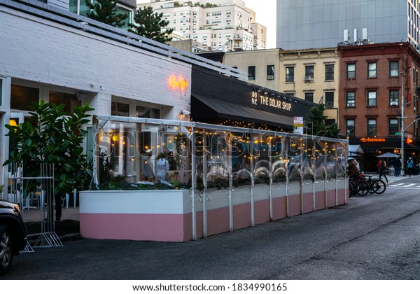 New York / USA - October 15 2020: An outdoor\
restaurant in downtown Manhattan. Phase 4 reopening of the Corona\
Virus pandemic.