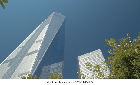 NEW YORK USA - OCTOBER 2, 2016 : CLOSE UP, LOW ANGLE VIEW Tall Main World Trade Center Building Complex Against Blue Sky. Famous Freedom Tower In Lower Manhattan 