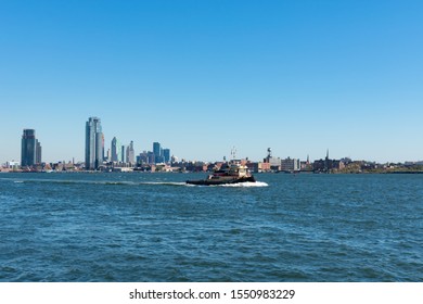 New York, New York / USA - October 21 2019: United States Army Corps Of Engineers Boat On The East River Looking Toward Brooklyn New York