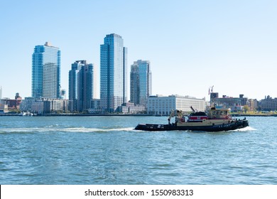 New York, New York / USA - October 21 2019: United States Army Corps Of Engineers Boat On The East River Looking Toward Brooklyn New York