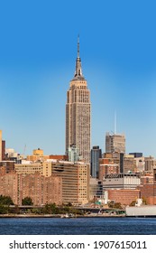 New York, USA - October 23, 2015: empire state building in New York seen from river Hudson.