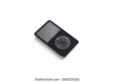 New York, USA - October 25, 2021 : Old Apple IPod Classic 3rd Generation 15Gb 2003 Mp3 Player. Vintage Used And Worn White Apple IPod Mp3 Player Isolated On White Background