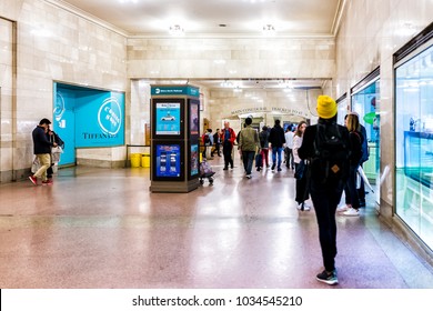 New York, USA - October 29, 2017: Grand central terminal entrance from subway in New York City with sign, many crowd crowded people walking, mta, stores shops, Tiffany and co