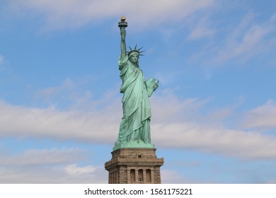 New York, USA - October 5, 2018: The Statue of Liberty, gift from France, is an icon of freedom and a national park tourism destination of the United States.