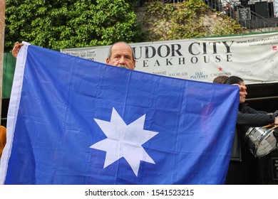 New York, USA, Oktober 25, 2019 Peaceful Chile Demonstration Opposite The UN Building. Protestors Are Demonstrating Against The Rising Cost Of Living And Income Inequality By Banging Kitchen Pots.