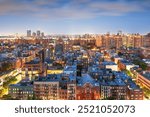 New York, New York, USA overlooking the Lower East Side towards Brooklyn at twilight.