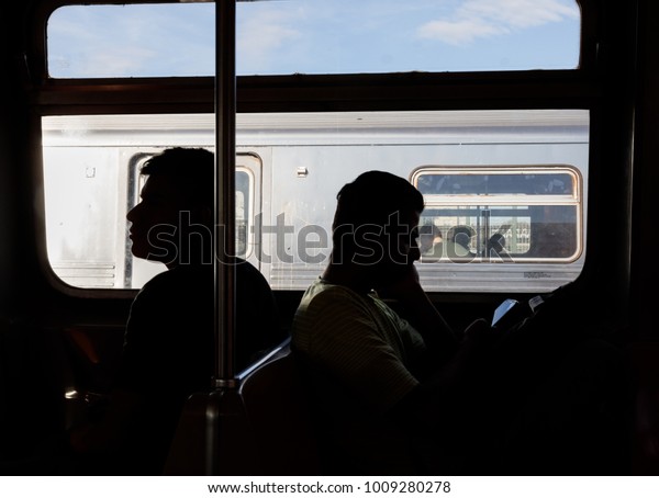 NEW YORK, USA\
- Sep 22, 2017: New York City Subway. Passengers in the subway\
train car. NYC Subway is one of oldest and most extensive public\
transportation systems in the\
world