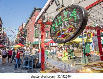 NEW YORK, USA - Sept 18th, 2015: Food Vendor Selling Italian Food In Little Italy On Mulberry St. During The Feast Of San Gennaro. Focus Is On The Pizza Sign.