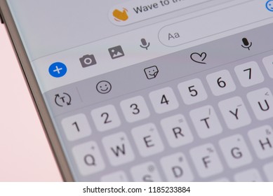 New york, USA - september 21, 2018: Texting in facebook bar messsanger on smartphone screen background close up view