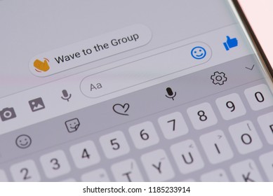 New york, USA - september 21, 2018: Texting in facebook messsanger on smartphone screen background close up view