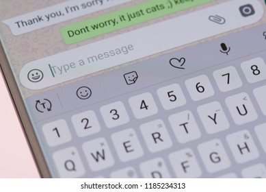 New york, USA - september 21, 2018: Texting in whatsapp messsanger on smartphone screen background close up view