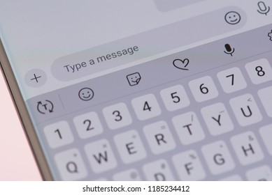 New york, USA - september 21, 2018: Type a messsage bar on smartphone screen background close up view
