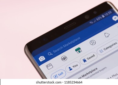New york, USA - september 21, 2018: Facebook marketplace search bar on smartphone screen background close up view
