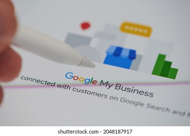 New York, USA - September 24 2021: Check Google My Business On Ipad Panel Screen Close Up View Using Pen