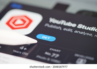 New York, USA - September 24 2021: Install Youtube Studio On Ipad Screen Close Up View Using Pen