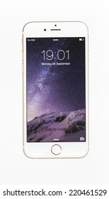 New York, USA - September 29, 2014: Studio Shot Of A White IPhone 6 Showing The Home Screen With IOS8. Isolated On White.