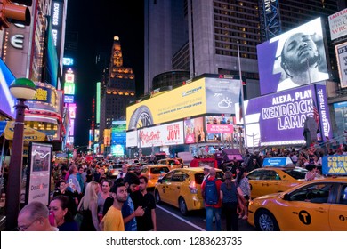 New York, USA - September 2nd, 2018
Large Crowd Of People On Times Square With Yellow Cabs Stuck In Traffic On Labor Day Weekend.