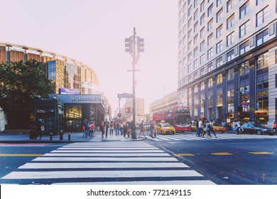 NEW YORK, USA - September 4th, 2017: busy streets of New York near Penn Station on a sunny late summer day with sun flare 