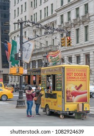 New York, USA-April 2018, People Buy A Hot Dog On The Street